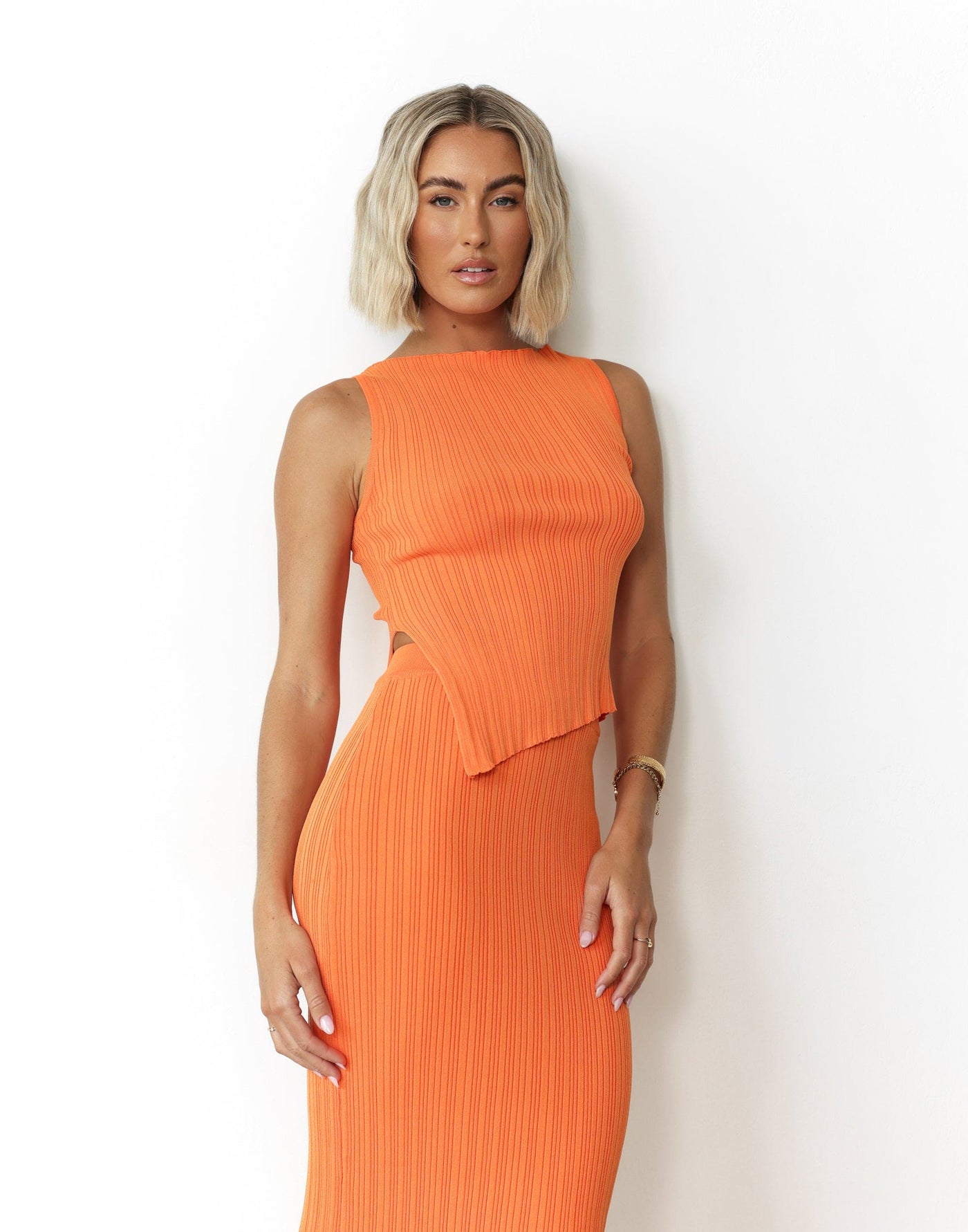 Kienna Top (Orange) - High Neck Ribbed Asymmetrical Hemline Top - Women's Dress - Charcoal Clothing